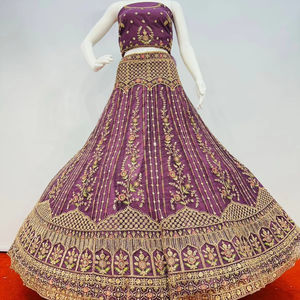 Grand look nuptial: filet lourd complet Lehenga Choli avec travail de designer, pierres Jarkan et Jaal Dupatta | 10 modèles disponibles - Product Image 1