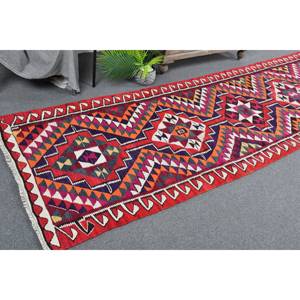 Alfombra de lana Kilim turca vintage de 32x11,2 pies, tejido plano de retazos de Color rojo con respaldo de látex - Product Image 1