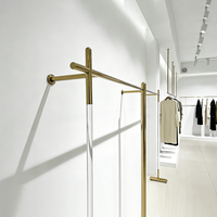 Porte-vêtements sur pied simple en tuyau industriel moderne, combinaison de présentoir mural pour magasin de vêtements
