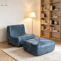 Sofá individual de lujo moderno tapizado en azul para sala de estar con otomana, ideal para venta al por mayor