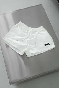 กางเกงขาสั้นผ้าร่มแห้งเร็วของผู้หญิงสำหรับเล่นฟิตเนสชายหาดและวิ่งทรงหลวมสตรีทแวร์ผ้าทอผ้าใบผลิตในเวียดนาม - Product Image 3