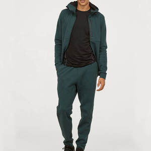 Chándal de diseñador para hombre Logotipo personalizado Sudadera con capucha y pantalones Jogger Tela de algodón pesado Fabricante OEM al por mayor. - Product Image 1