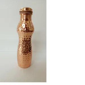 custom made hammered copper bottles with curved shapes ideal for water bottle stores suppliers available in 950 ML