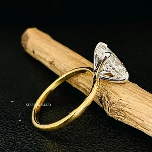 แหวนหมั้นทองคำแท้ 14K ประดับเพชร CVD รูปไข่ 3 กะรัต รับรองโดย IGI ดีไซน์ซ่อนวงแหวนรอบเพชร สไตล์คริสเตียนสุดหรู - Product Image 1