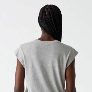 T-shirts pour femmes en coton biologique 100% à la mode-T-shirt surdimensionné à épaules tombantes en vrac de style dernier cri pour femmes - Product Image 6