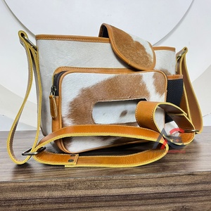 Nouveau sac de rangement pour poussette en cuir de vache véritable, sac à langer pour bébé en cuir de vache avec porte-bouteille, poche avant et compartiment zippé - Product Image 1