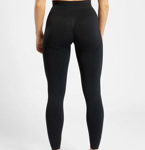 Mallas deportivas de alta elasticidad para mujer, pantalones de yoga sin costuras de color personalizado - Product Image 1