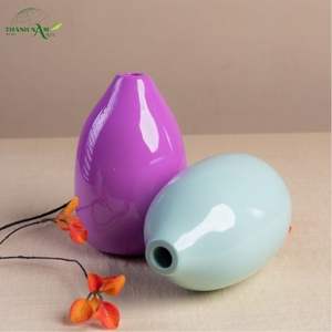 Vase de table en bambou Art Déco, forme en spirale, écologique et décoratif, couleur silencieuse - Product Image 1