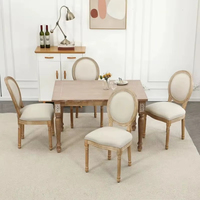 Chaise de salle à manger de style français luxueuse, siège en tissu rembourré, dossier ovale, structure en bois, mobilier classique européen