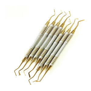 Ensemble de spatules en résine dentaire plaqué titane Instrument de remplissage composite manuel pour le nettoyage des dents Spatules en résine pour le travail dentaire - Product Image 1