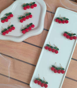 Handcrafted, Fashionable, and Compact Fruit-patterned Crocheted Earrings and Eardrops - Product Image 1
