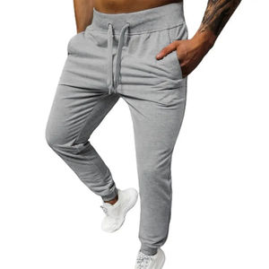 2024 Simple Color sólido tobillo banda hombres pantalones cálidos cintura elástica soporte bolsillos pantalones de gran tamaño pantalones de chándal ropa de calle para otoño - Product Image 1