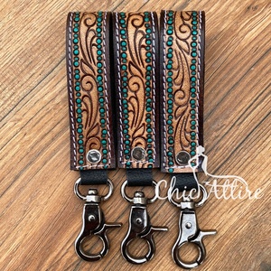 พวงกุญแจหนังวัวแบบเป็นเครื่องมือสำหรับแต่งมือพวงกุญแจขนาดเล็กทนทานและติดทนนานพวงกุญแจรถหนังแท้ - Product Image 1