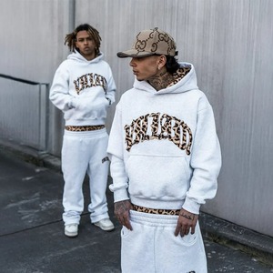 ชุดวอร์ม Y2k ผู้ชายผู้หญิงชุดเย็บลายเสือดาวย้อนยุคที่เหนือกว่าเสื้อผ้าแนวสตรีทแบบอเมริกันเครื่องแต่งกายลำลองสำหรับคู่รักทั้งชายและหญิงที่กำลังมาแรง - Product Image 1