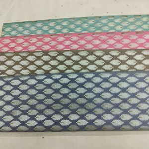 Custom Made Brocade Silk Fabrics in a Wide Assortment of Patterns Suitable for Clothing Store for Resale in Silver Print - Product Image 1