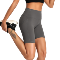 Shorts de yoga taille haute pour femmes, extensibles dans quatre directions, en Spandex/Nylon, design rehausseur de fessiers, poches latérales - OEM Sports Fitness