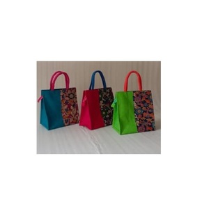 Bolsas de mano de yute de material fuerte de Venta caliente con asa de agarre suave inferior reforzada y diseño simple para uso diario - Product Image 1