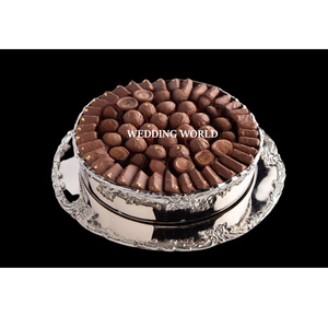 La mayoría de las tendencias del cuenco de chocolate de metal en Oriente Medio Cuenco dulce con acabado plateado brillante Cuenco de chocolate en relieve de lujo de forma redonda - Product Image 1