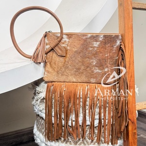 กระเป๋าหนังวัวสไตล์ตะวันตกที่ทำจากขนสัตว์กระเป๋าถือมีหลายแบบสำหรับผู้หญิงกระเป๋าถือสายคาดกระเป๋าคาดผมแบบโบฮีเมียนขนสัตว์ใช้งานได้หลากหลาย - Product Image 1