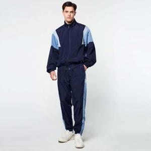 Chaqueta de chándal unisex color block-Chaqueta atlética moderna y cómoda para trotar - Product Image 1