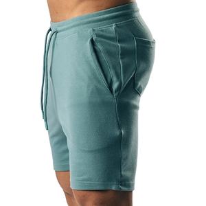 กางเกงขาสั้นลำลองแฟชั่นแนวสตรีทของผู้ชายผ้าฝ้าย100% ผ้าฝ้ายเอวยางยืดมีกระเป๋าข้างดีไซน์ใหม่2025 - Product Image 1