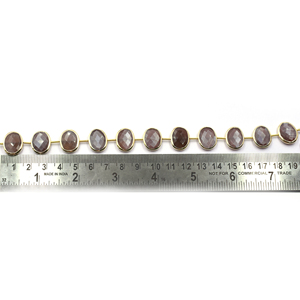 Pierre de lune marron 15 à 17 MM forme ovale lunette en argent plaqué or centre percé 11 perles brin - Product Image 4