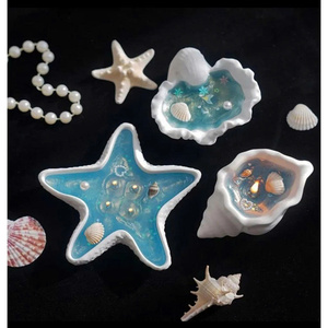 Vela de Concha Marina Diseñada para Bodas con Temática Playera que Aporta Encanto y Ambiente Relajante de Playa - Product Image 6