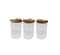 Pot transparent le plus populaire Conteneur de stockage de cuisine Bouteilles en verre avec couvercle en bois Nouveau style de conteneur de stockage Pot