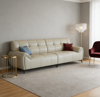 Canapé modulable en cuir contemporain haute résilience avec coussins moelleux, idéal pour salon ouvert