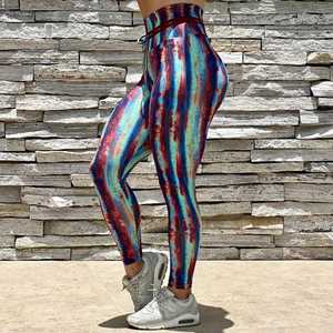 Venta al por mayor Leggings de compresión Mujeres Levantamiento de glúteos Pantalones de yoga desnudos de cintura alta Leggings deportivos elásticos - Product Image 1