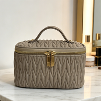 Sac de rangement de maquillage portable de luxe de haute qualité, en PU crème, pour femmes, avec fermeture éclair, élégant et durable