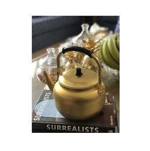 Engraved decorative brass metal <b>tea</b> pot handcrafted by skilled artisans ideal for cultural <b>tea</b> presentation and festive use - Product Image 1