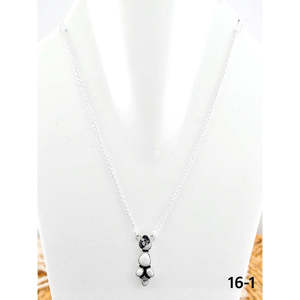 Collier artisanal en argent sterling style sud-ouest avec breloques turquoise serties de buffle blanc et incrustations religieuses - Product Image 1