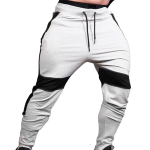 กางเกงวิ่งขายาวสำหรับผู้ชายชุดออกกำลังกายกางเกงใส่วิ่งเย็บปะแบบลำลองไซส์ใหญ่พิเศษออกแบบได้ตามต้องการ - Product Image 1