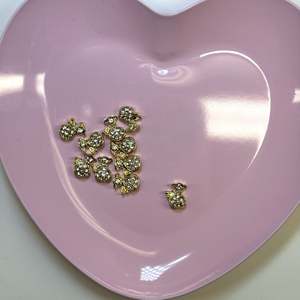 A10jet 10pz Decorazioni per Unghie Dorate Stile Sacchetto di Denaro Accessori per Nail Art - Product Image 1