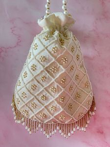 2025@Elegant <b>White</b> Potli <b>Bags</b> on Raw silk Fabric with Heavy Embellished Pearls, Crystal Glass Beads Work for Party-wear/Wedding - Product Image 2