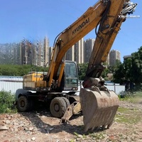 Excavatrice sur roues Hyundai R210W de 21 tonnes, moteur Cummins B5.9 C, d'occasion, pour travaux de construction et réparation routière en Corée.