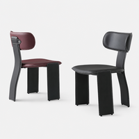 Chaise de salle à manger minimaliste de style italien en cuir pleine fleur avec capacité de charge de 500 kg, siège rembourré doux, design moderne pour la maison et l'hôtellerie
