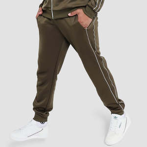 กางเกงจ็อกเกอร์ผู้ชายทรงหลวมเอวกลางผ้าแคนวาสสีพื้นมีเชือกผูก  ลายโลโก้พิมพ์  ทรงโอเวอร์ไซส์ - Product Image 2