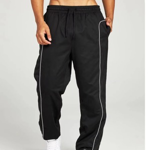 Dernier design de luxe Pantalon de survêtement en nylon à jambe droite pour hommes Pantalon de sport large et large imperméable avec passepoil - Product Image 1