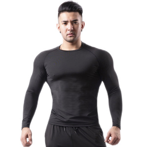 เสื้อฟิตเนสแขนยาวสำหรับผู้ชายเสื้อฟิตเนสเข้ารูปคอกลมผ้ายืดหยุ่นสูงแห้งเร็วออกแบบโลโก้ได้ตามต้องการ - Product Image 5