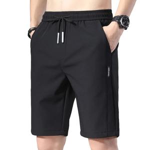 Pantalones cortos de dormir para hombre, pantalones cortos informales de verano para hombre, cintura elástica, rectos, color sólido, seda helada, deportes, bolsillo fino, hasta la rodilla, pantalones para hombre - Product Image 1