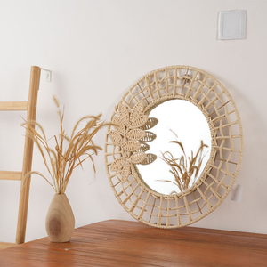 Miroir mural rond en rotin naturel tissé à la main avec cadre décoratif en feuilles pour la décoration bohème de la maison - Product Image 1