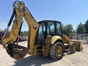 Chargeuse-pelleteuse Cat 430 avec godet avant et bras de terrassement arrière, équipement de construction jaune - Product Image 6