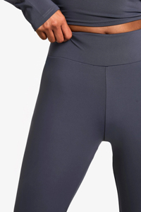 กางเกงเลกกิ้งออกกำลังกายเอวสูงสำหรับผู้หญิง ขายส่ง กางเกงฟิตเนสเอวกลาง ผ้าไร้ตะเข็บ ชุดโยคะ และเลกกิ้งยกกระชับสะโพก - Product Image 3