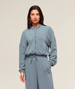 Vente en gros bleu de fer Ensemble de survêtement 2 pièces midi gaufré avec fermeture éclair Ensemble de survêtement à capuche et pantalon de survêtement Ensemble de survêtement court 2 pièces pour femmes - Product Image 6