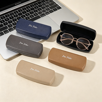 Vente en gros de nouveaux étuis à lunettes en cuir grainé, étuis à lunettes de soleil en métal, logo personnalisé, étuis à lunettes antichoc