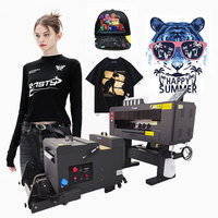 Imprimante CMJN automatique DTF quatre couleurs 30cm machine à secouer poudre rouleau à rouleau nouveau film PET blanc vêtement vêtement 1 an