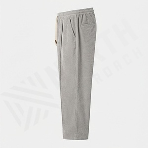 Pantalons en velours côtelé de couleur personnalisée avec cordon de serrage en bois verni, plis cousus, poche zippée dissimulée, vente en gros - Product Image 3