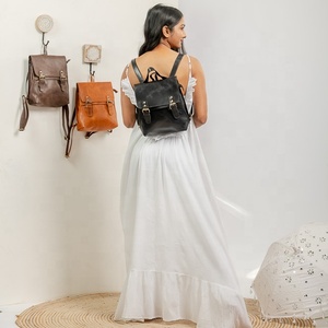 Handcrafted <b>Small</b> Leather <b>Backpack</b> with Two Front Pockets Full Leather Dress and Rock Style Portable PVC Lining - Product Image 1